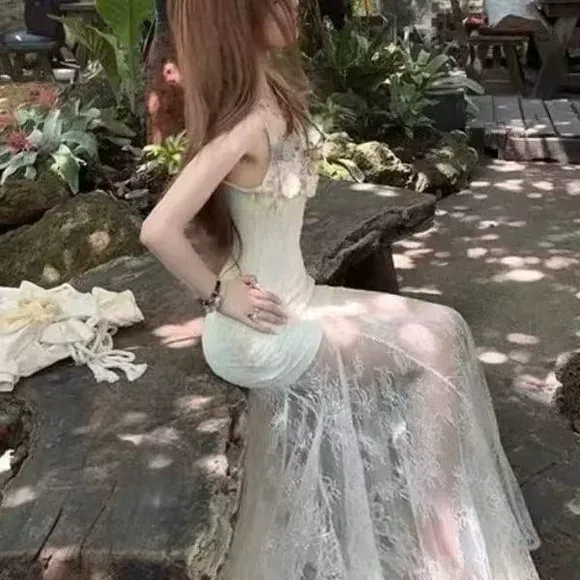 夏季新款度假风沙滩海边仙女长款裙子重工立体花朵网纱吊带连衣裙