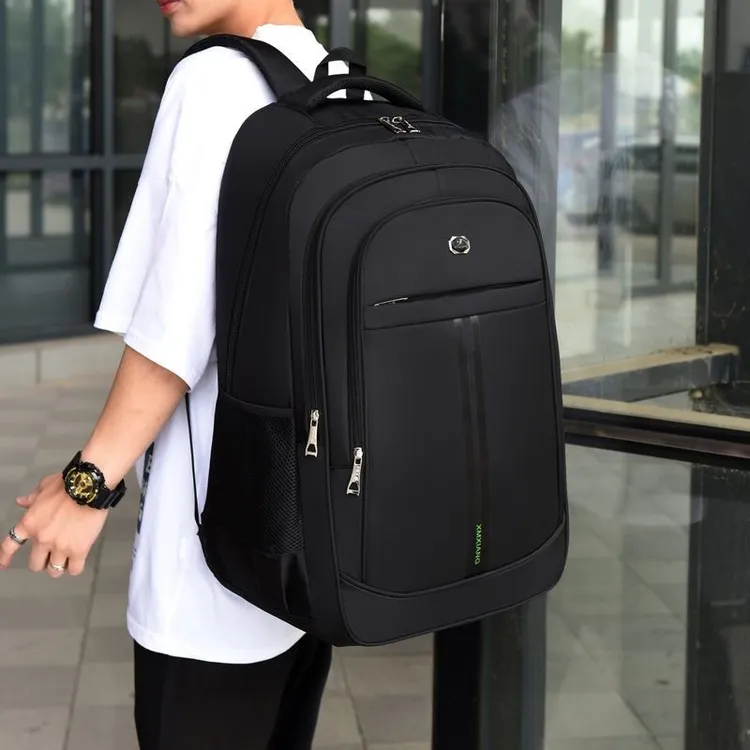 大容量旅游双肩包耐磨旅行登山防水背包打工出差男士初高中书包