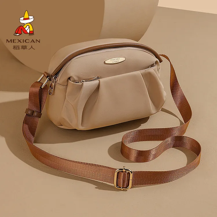 稻草人包包女新款帆布包大容量时尚斜挎包气质高级上班通勤包女包