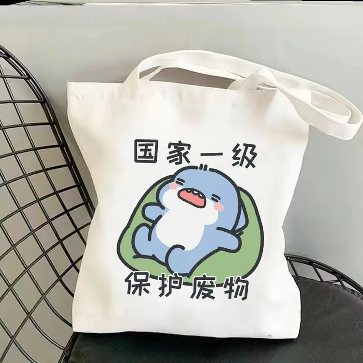 呆萌小鲨鱼表情帆布包可爱肥肥鲨鱼学生书包购物袋大容量手提袋包