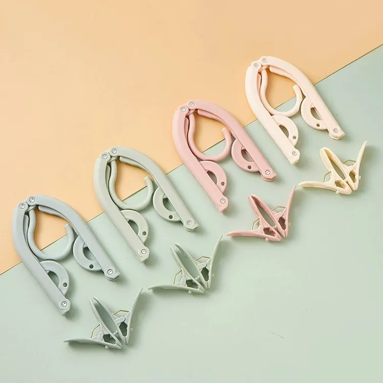 网红折叠衣架简约便携旅游用品家用挂衣宿舍出差酒店防水晾衣架