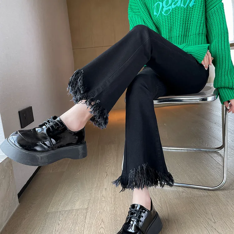 黑色流苏毛边微喇牛仔裤女2025年春秋新款九分开叉高腰显瘦喇叭裤