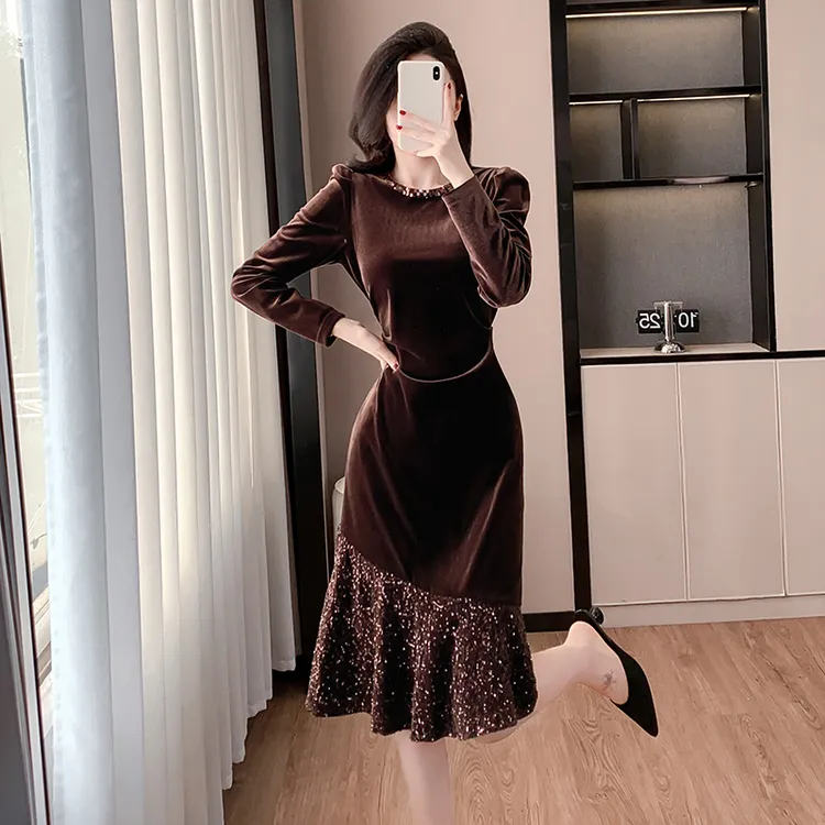 法式秋冬新款赫尔本风名媛气质重工鱼摆拼接珍珠片设计长袖A字裙