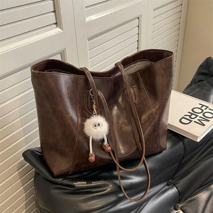 包包女大容量2025新款春夏高级感棕色大学生上课单肩包通勤托特包