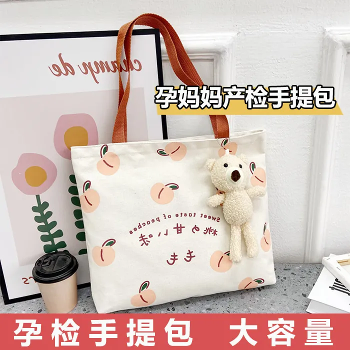 孕检产检手提包大容量妈咪包资料收纳袋上班族通勤帆布包包大学生