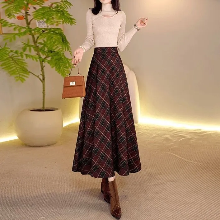 毛呢格纹半身裙2025秋冬新款高腰遮胯显瘦复古气质a字大摆伞裙子