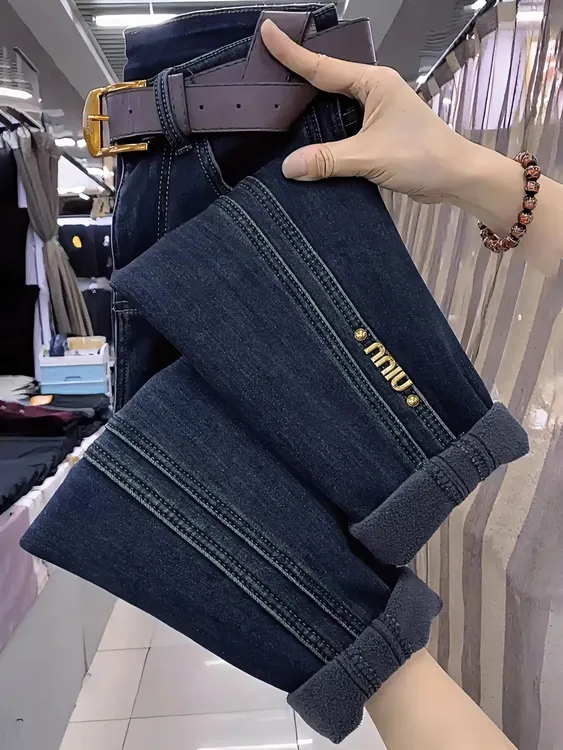 梨形身材微胖2025秋冬显瘦高腰宽松弹力大码女装哈伦加绒牛仔裤