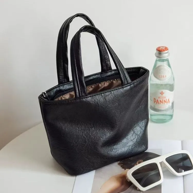 新款休闲百搭女包简约小皮包时尚女士化妆包纯色可爱迷你手拎包