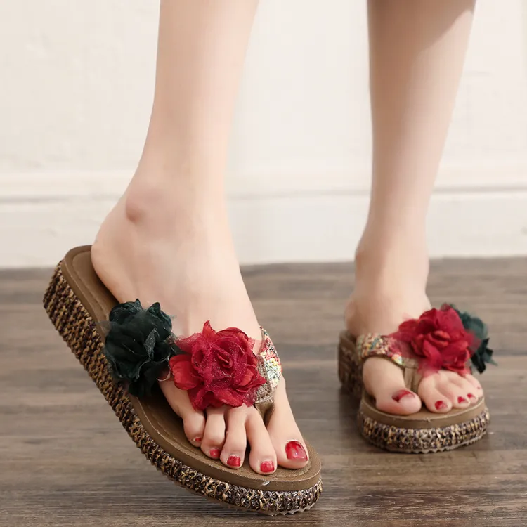 人字拖鞋女外穿花朵夏季厚底增高防滑沙滩韩版休闲网红夹脚凉拖鞋
