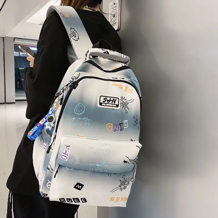 书包男大容量韩版潮流涂鸦中学生双肩包休闲百搭高中生旅行背包男