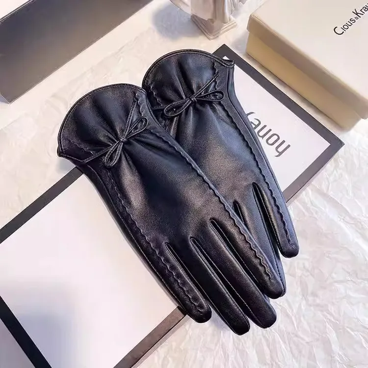 韩版秋冬蝴蝶结小羊皮真皮手套女士冬季保暖加绒加厚骑行触屏防风
