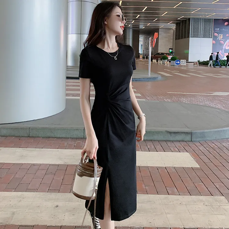 夏装新款2025年棉休闲显瘦中长款扭腰开叉大码不规则气质连衣裙