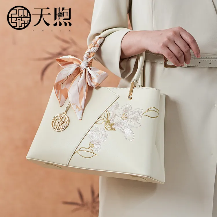 天煦非遗国风《玉兰》新中式国风琼娘娘款真皮刺绣手提单肩斜挎包
