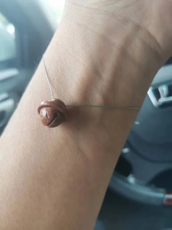 龙纹桃核雕刻：小铃铛