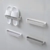 拖鞋架浴室免打孔壁挂卫生间免钉拖鞋收纳神器墙壁粘贴沥水置物架