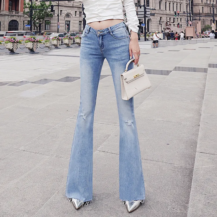 uun'reds/音率意大利低腰水洗磨破浅蓝色大喇叭牛仔长裤喇叭裤