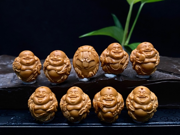 立雕弥勒 尺寸2.3*2.6cm 舟山橄榄核雕纯手工雕刻文玩手串