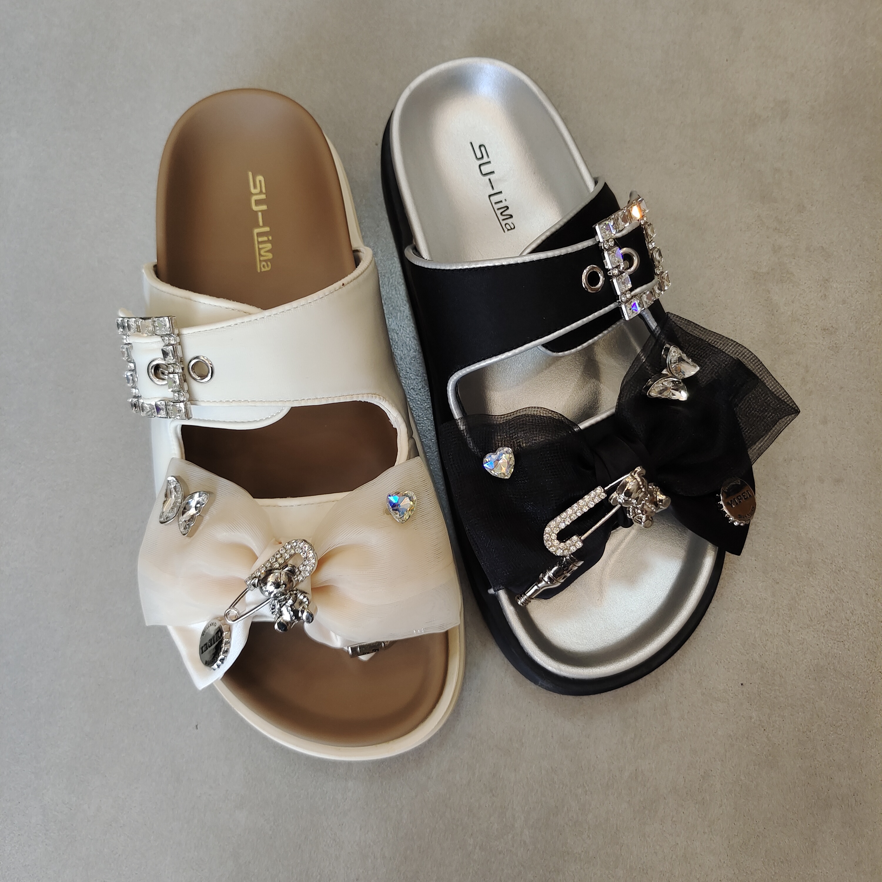 117-3蝴蝶结凉拖鞋女2024夏新款平底外穿沙滩鞋舒适软底（速利玛）