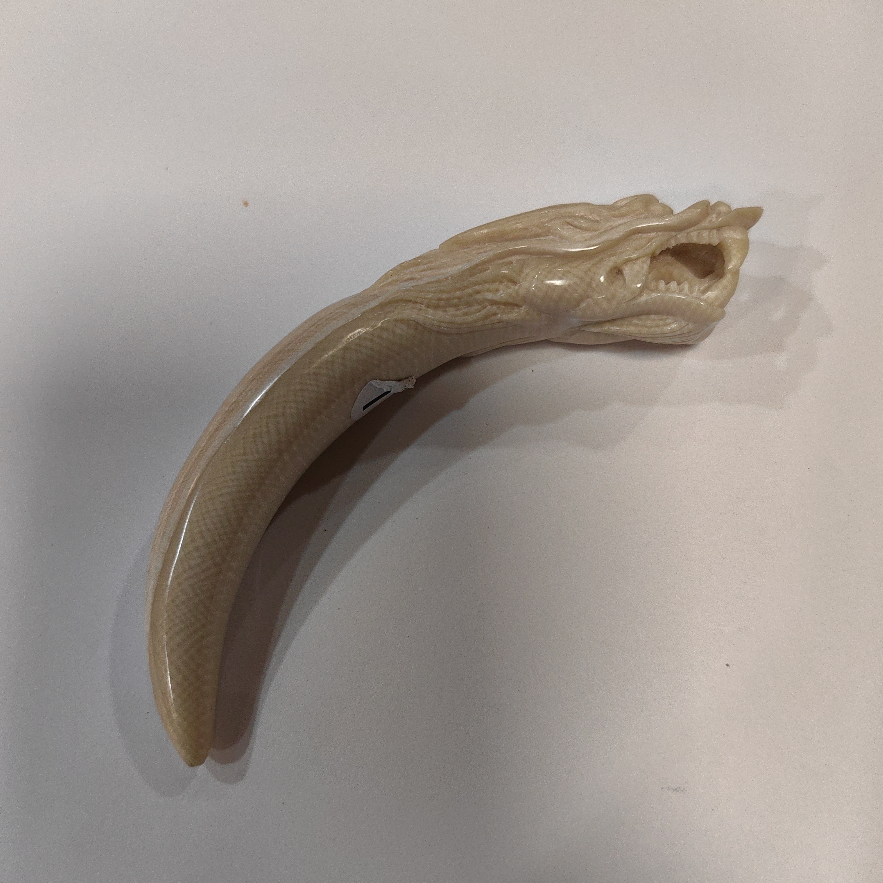 橄榄核雕刻龙牙尖约27克K31