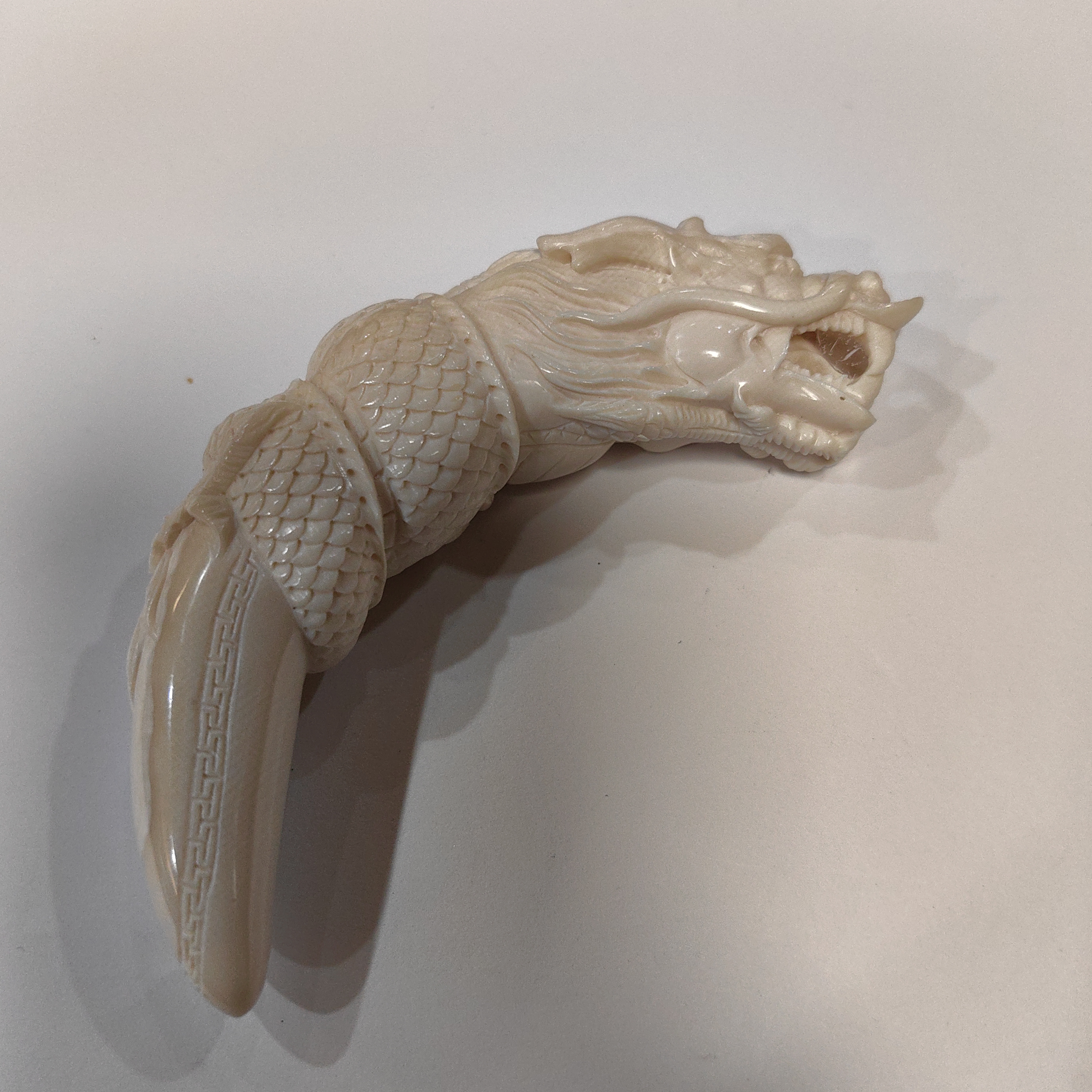 橄榄核雕刻龙牙尖约58克K32