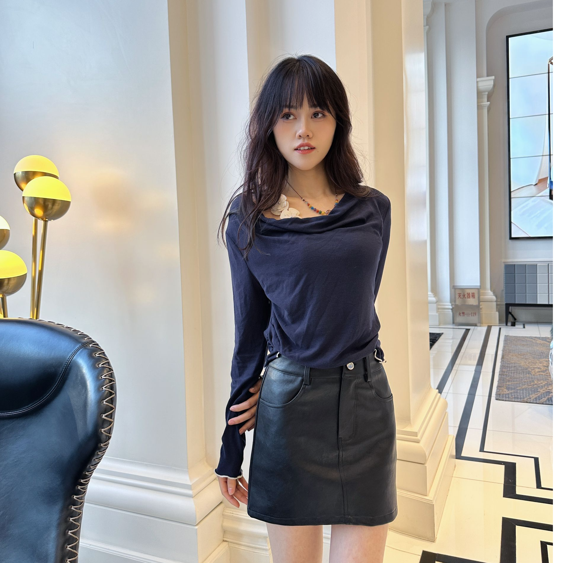 新姿奇门襟拉链装饰小A包臀短裙时尚洋气显高显瘦半身pu皮半身裙