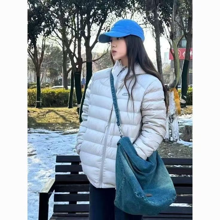 冬季排骨羽绒服女鸭绒情侣男外套轻薄保暖新款2025面包服加厚潮