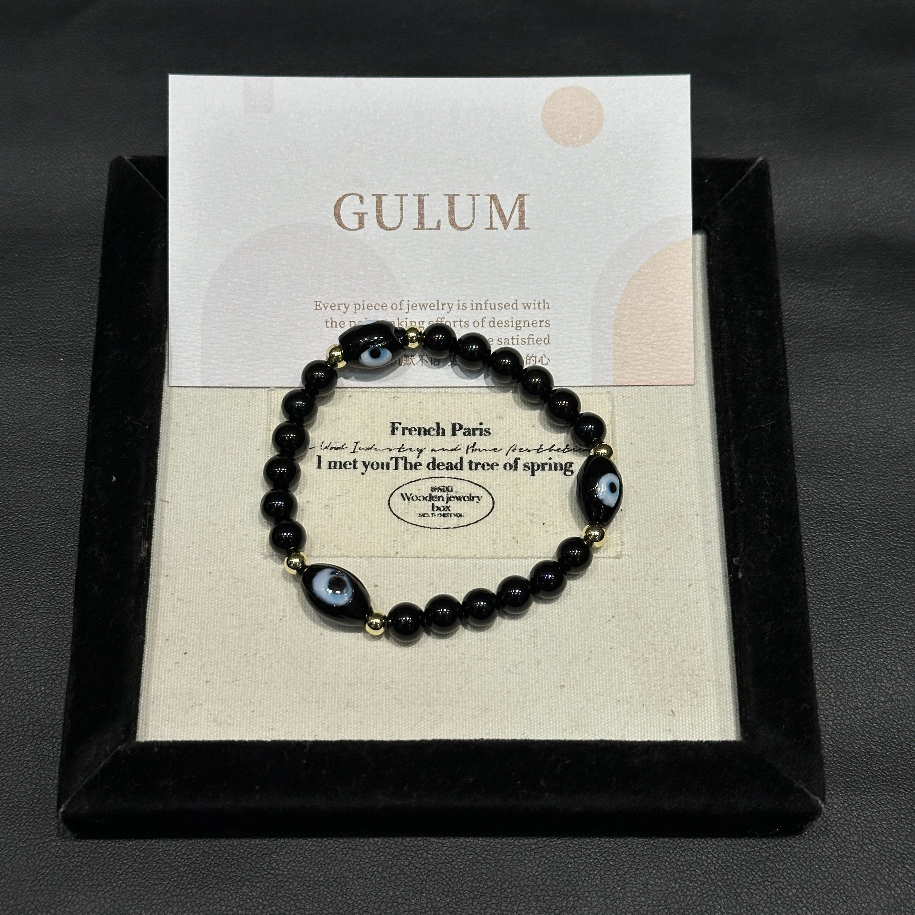 非金属亚克力手链 GULUM 359 手工黑色蓝眼睛弹力绳手链情侣