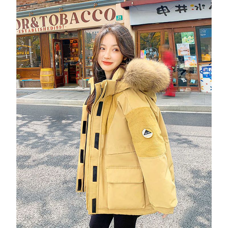 雪中飞羽绒服冬季新款大毛领派克羽绒服女中长款高级感小众设计工