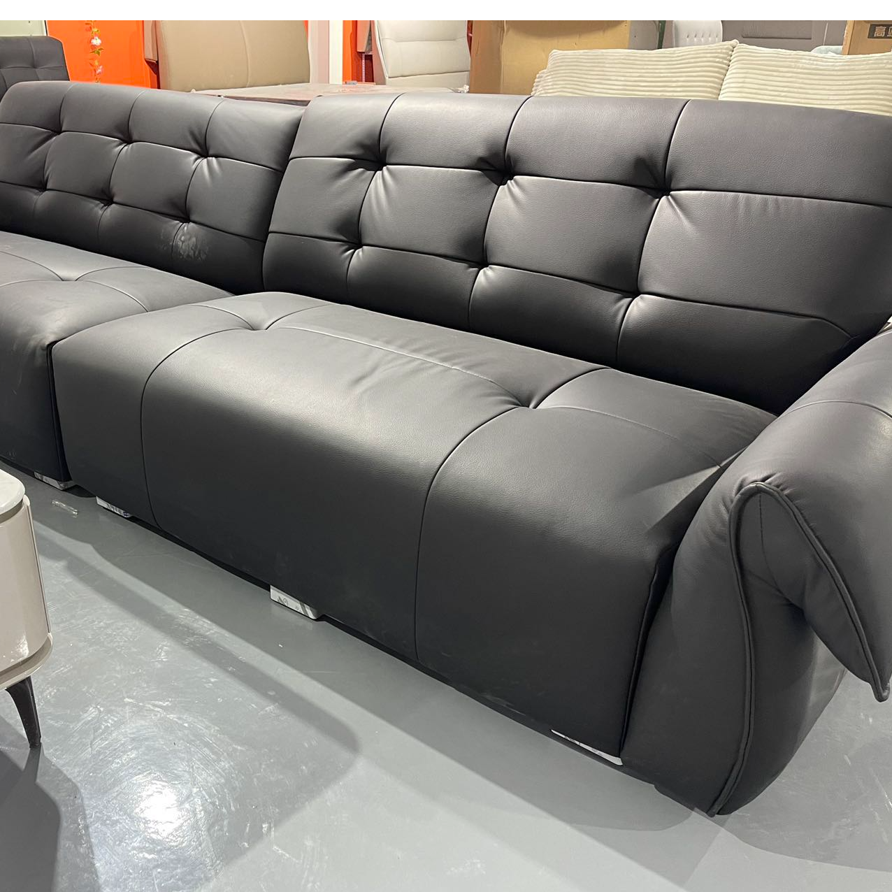 新疆包邮意式极简植物真皮黑天鹅沙发