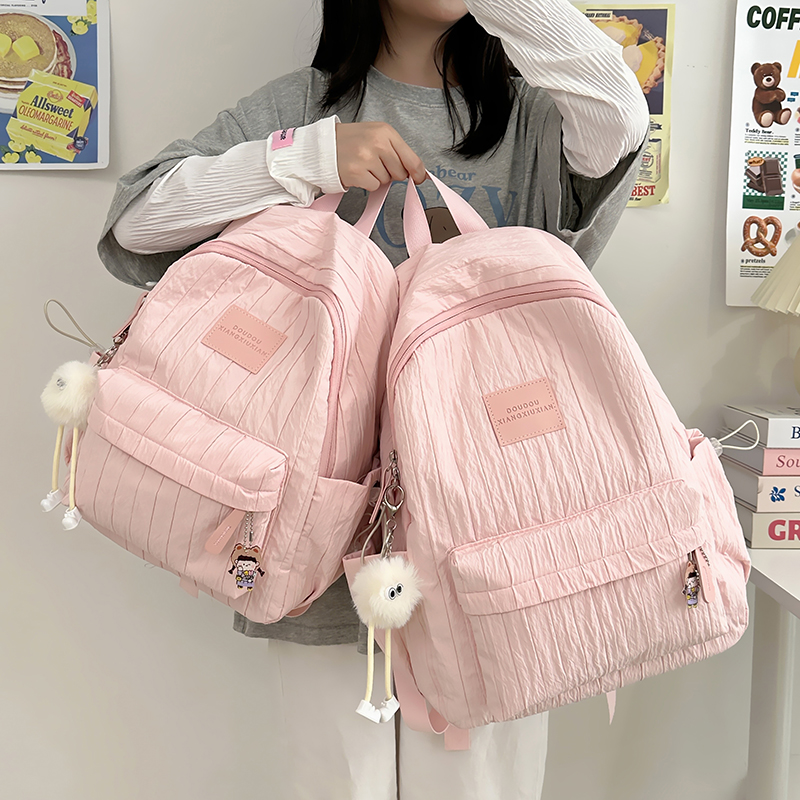 日系学院风森系书包女大学生时尚百搭双肩包休闲纯色少女旅行背包