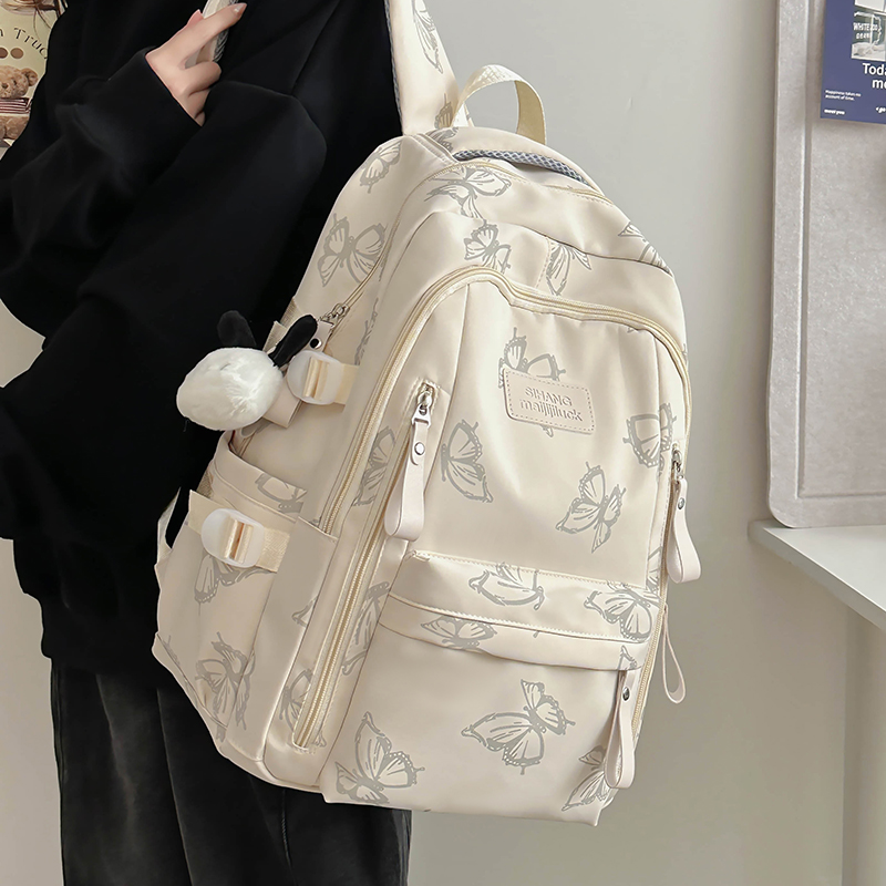 高颜值蝴蝶双肩包ins风初中女生高中学生书包大容量电脑旅行背包
