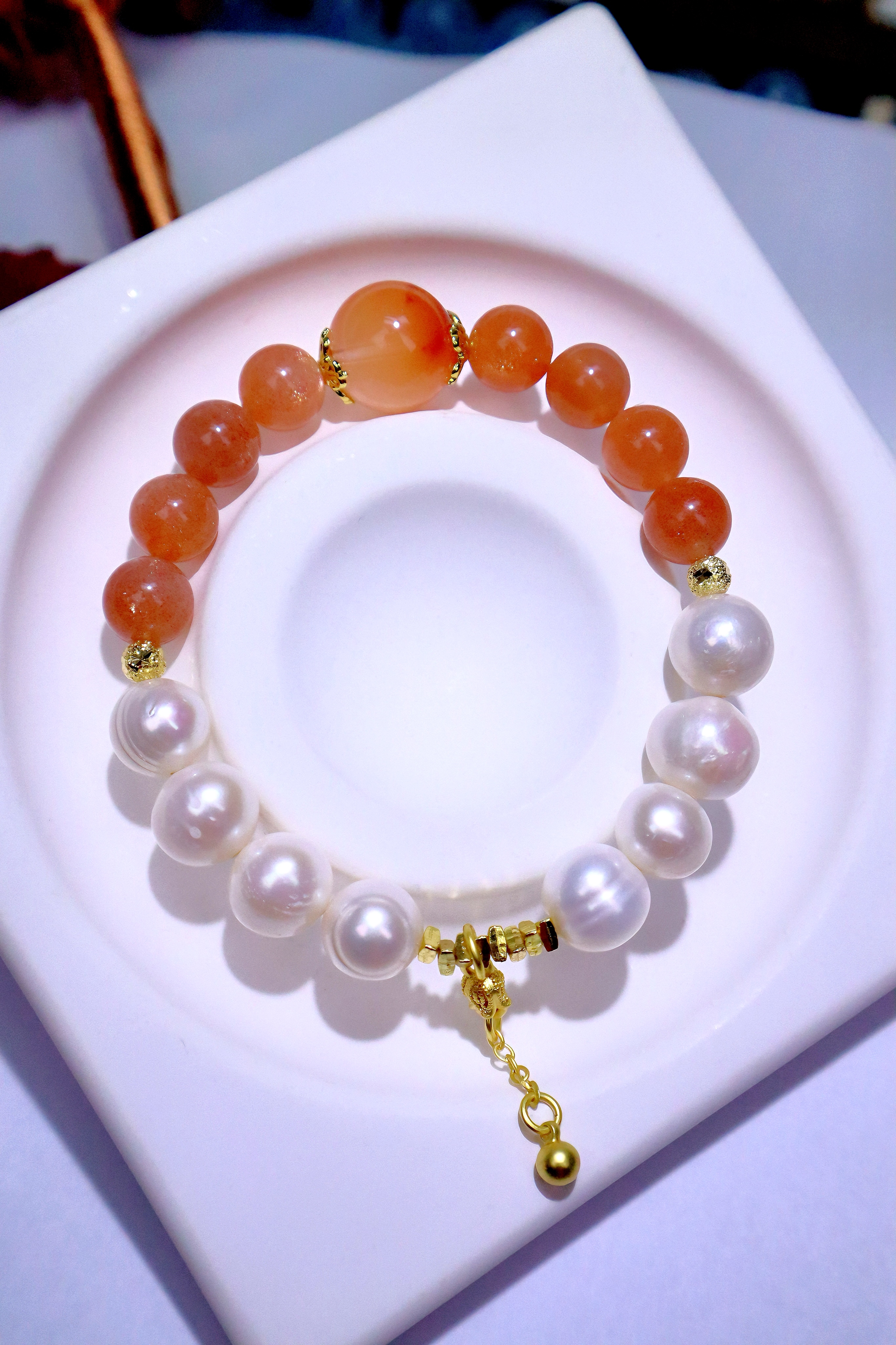 精品天然珍珠红兔毛金太阳手链