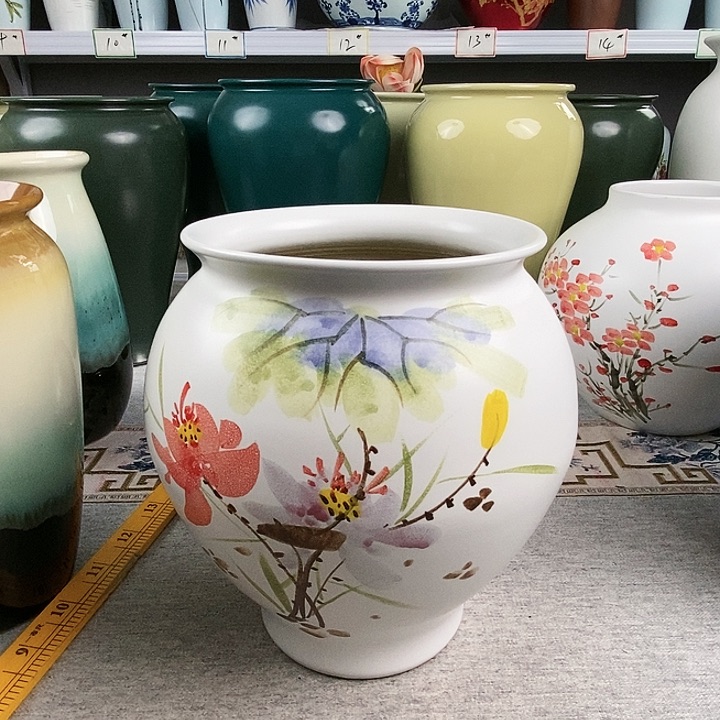 高21.5内口径13.5，手工手绘，底部有孔，球形花盆