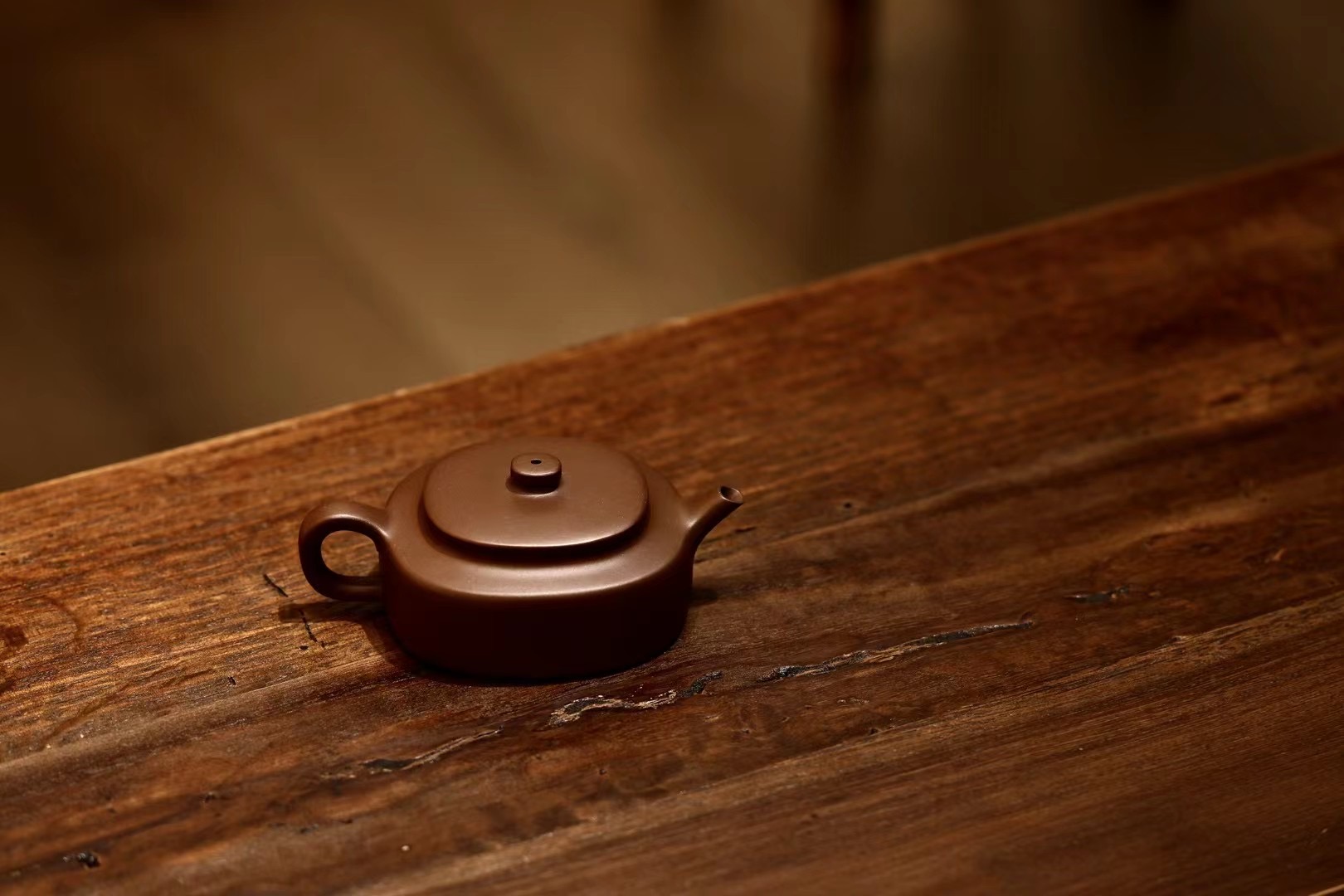 汤跃腰圆周盘紫砂壶