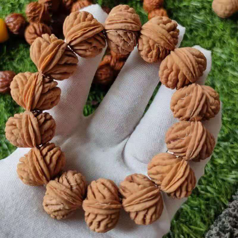 秦岭野生龙纹桃核刺龙纹手持，手串