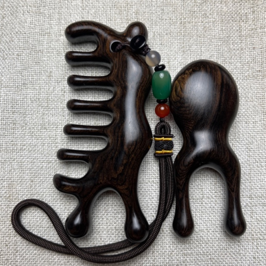 千年乌木紫光檀大蜗牛多功能按摩梳可收藏