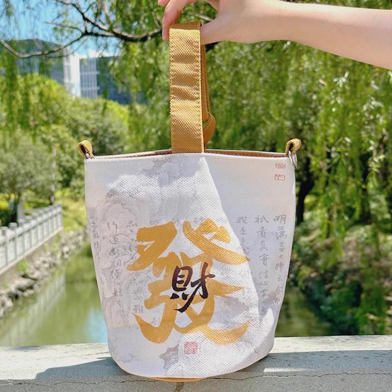 大容量斜挎单肩手提包水桶包