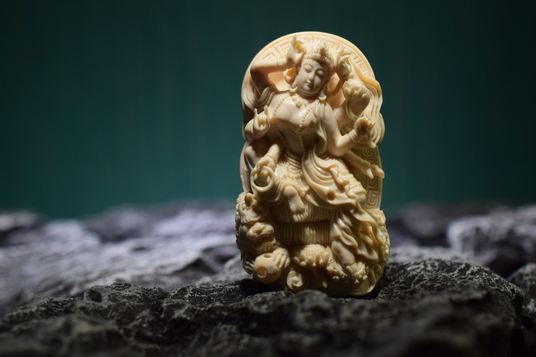 猛犸千手手把件牌子