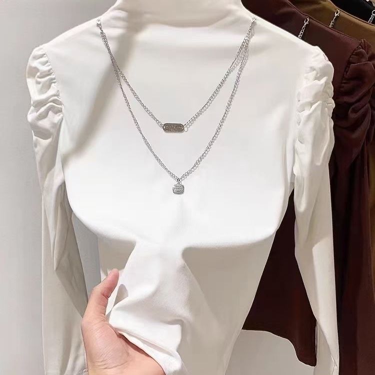 莫代尔秋冬新款加绒高级感打底衫女半高领修身内搭泡泡袖上衣