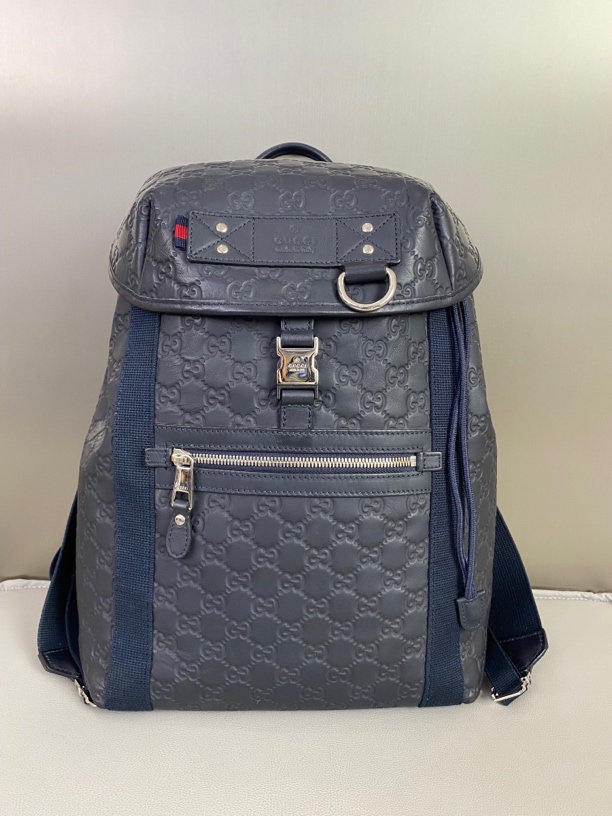 95新 GUCCI/古驰 蓝色全皮压纹翻盖抽绳双肩包背包通勤包97新