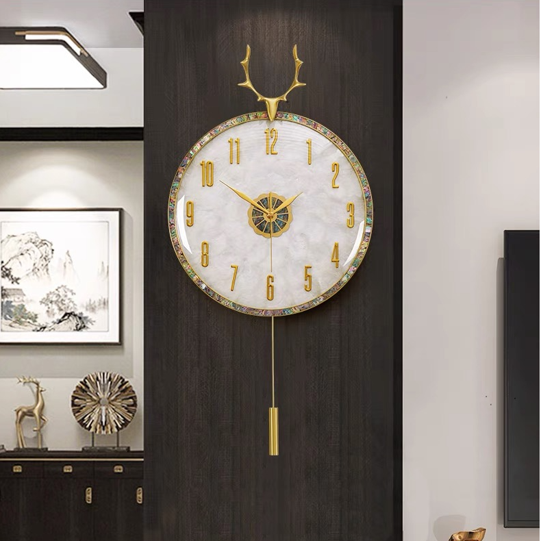 轻奢鹿角家居装饰钟表黄铜贝壳挂钟带钟摆创意客厅挂钟
