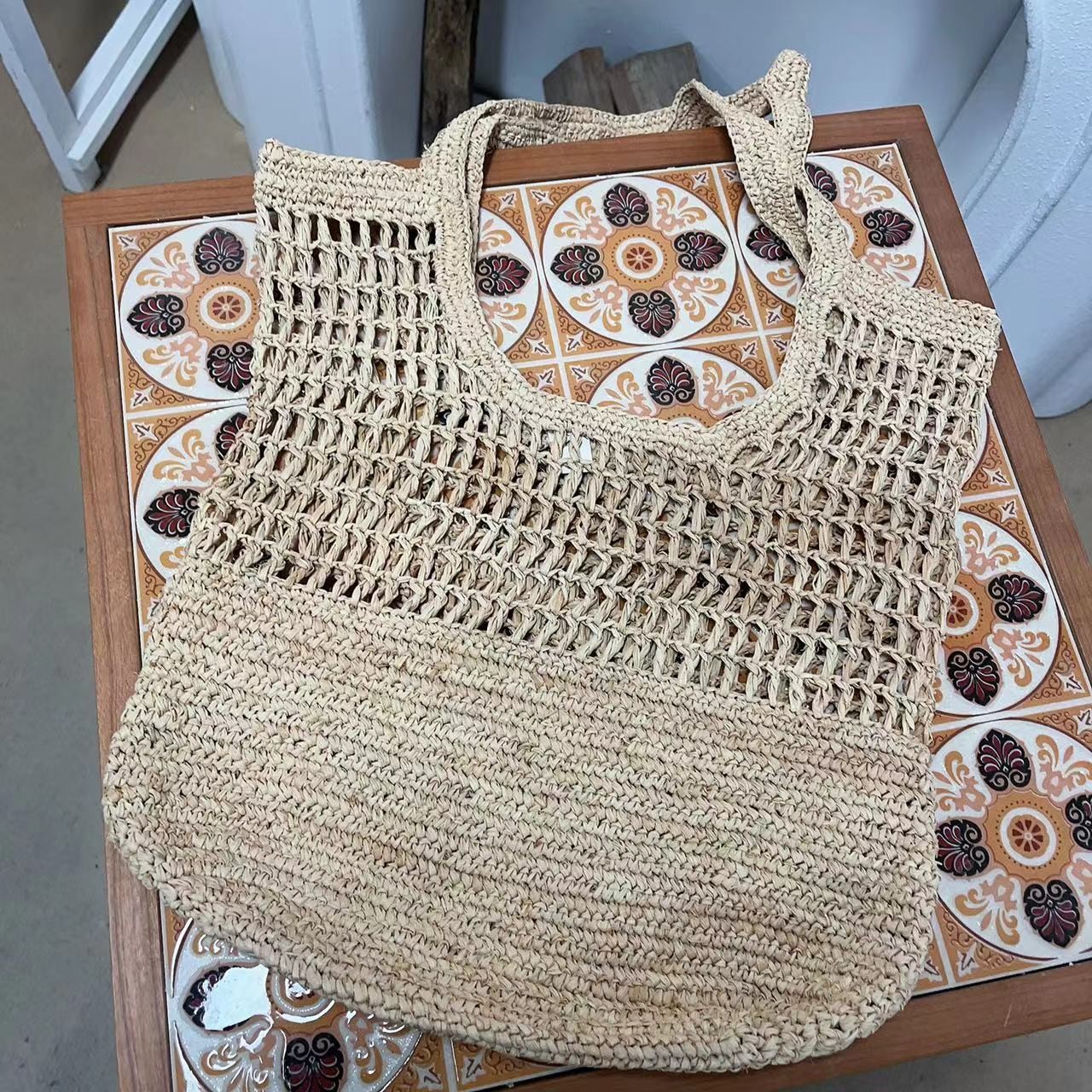 春夏款草编手工小众上部镂空单肩包  雪雪1609