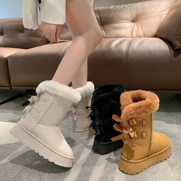 百搭网红爆款皮毛一体蝴蝶结雪地靴女中筒加厚东北羊毛棉鞋高筒