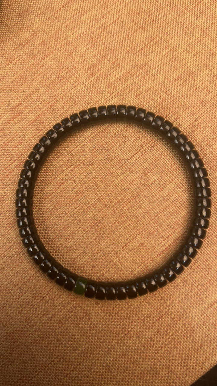 华夏和田玉黑青手串