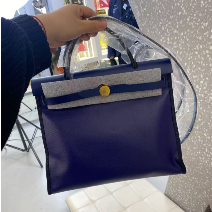 未使用 Hermes/爱马仕 昊哥/herbag蓝防水布包/z刻尘袋