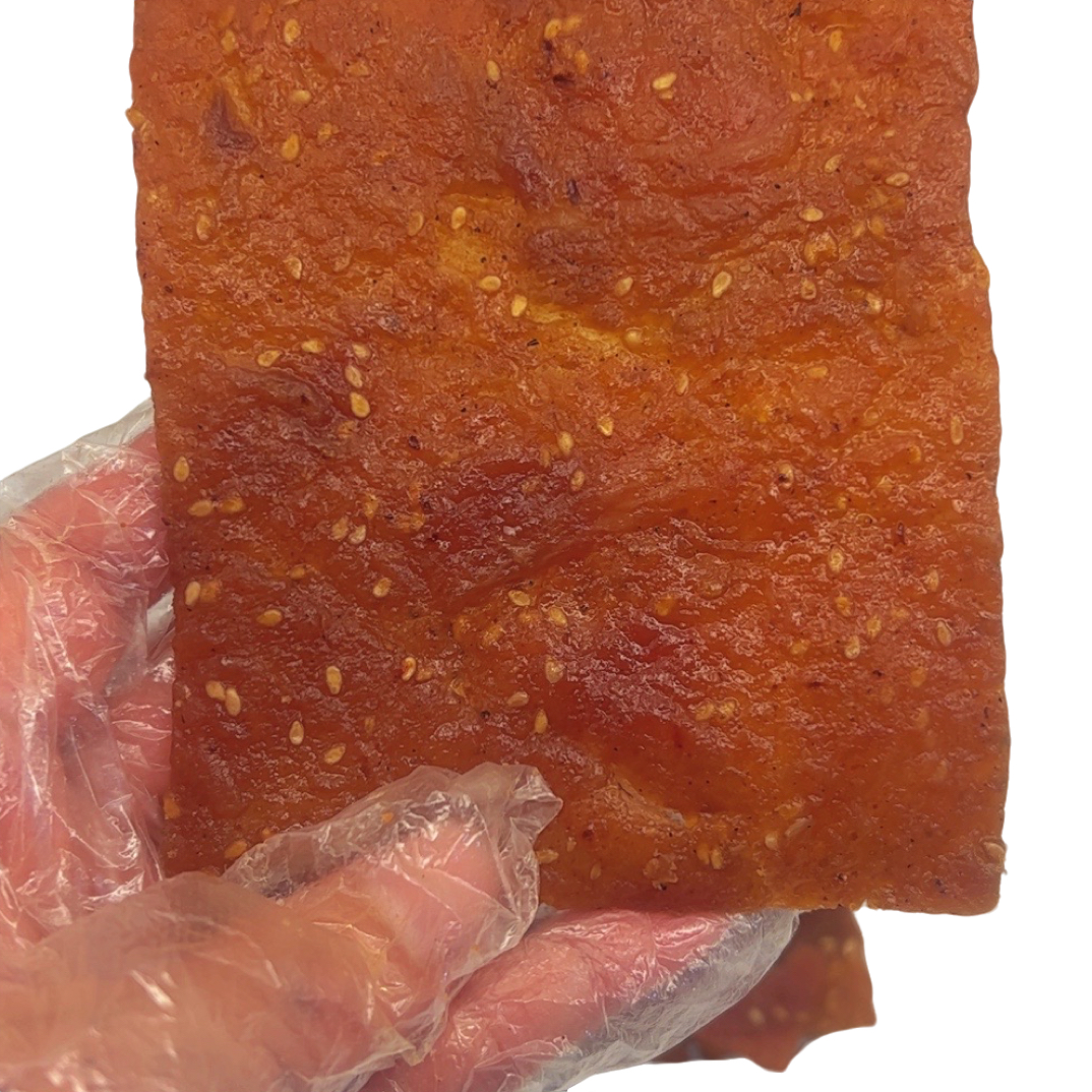 香辣味的猪肉脯男女老少喜爱口感嫩而不腻香辣可口满满的芝麻香