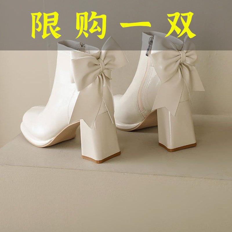 红蜻蜓牌百搭靴子秋款女马丁靴白色增高短筒蝴蝶结粗跟防水台高