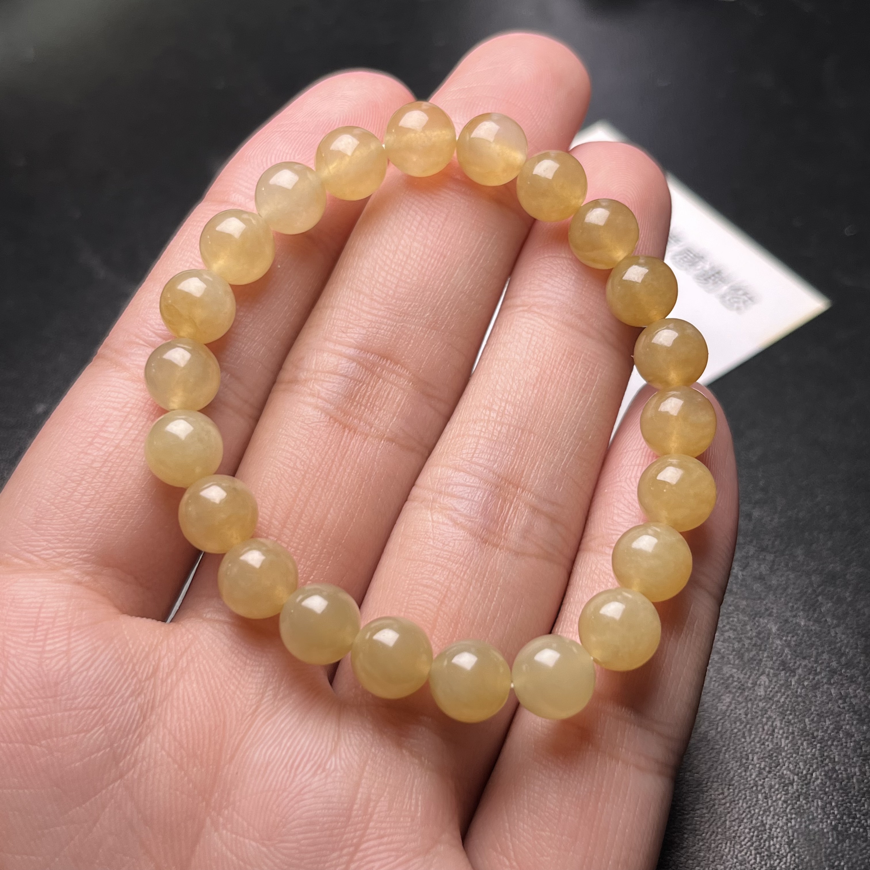 思思翡翠直播间冰黄珠串完整度高，底子干净老坑种水料