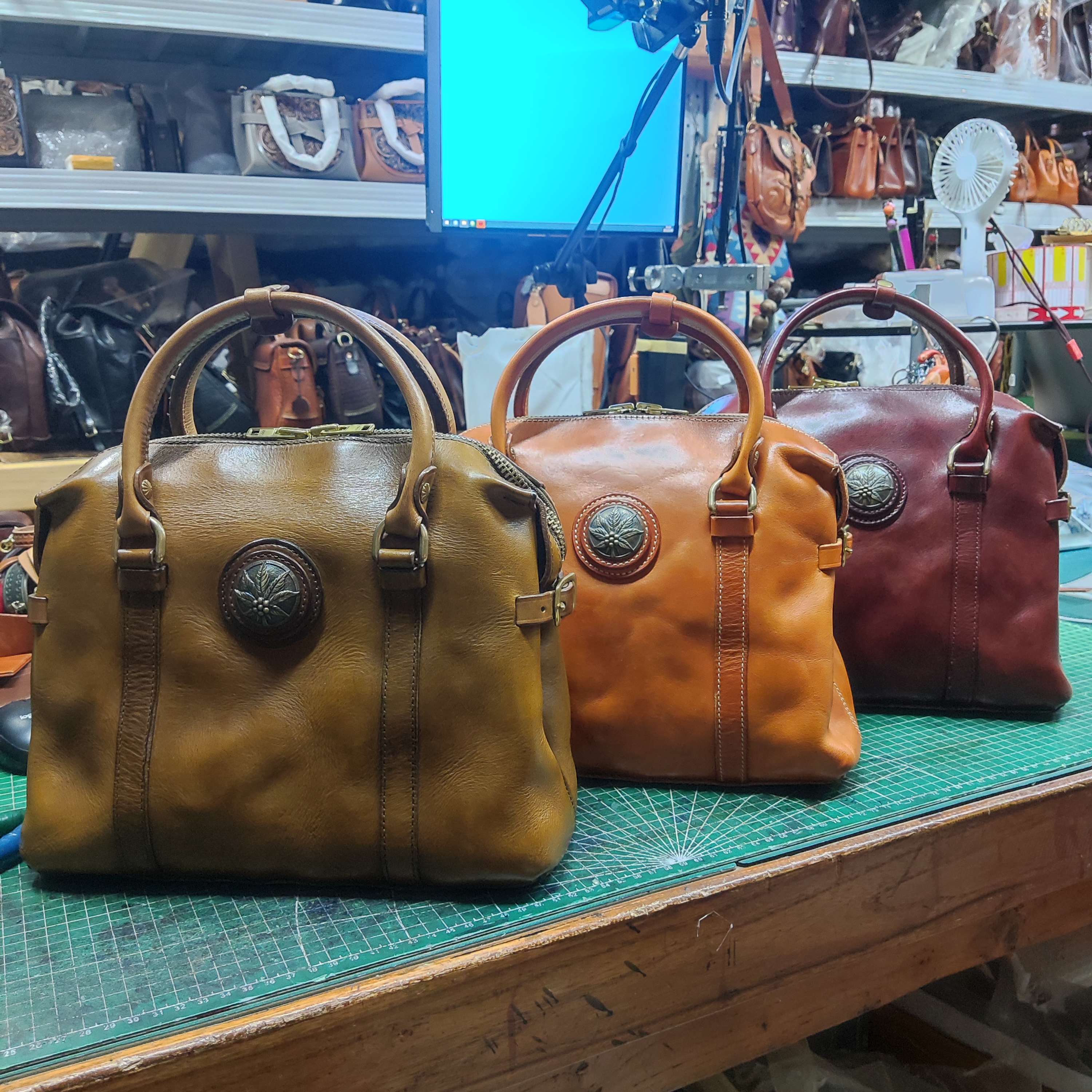 WANMUWANPI/顽木顽皮日落系列重工头层牛皮手拎斜挎包L12073