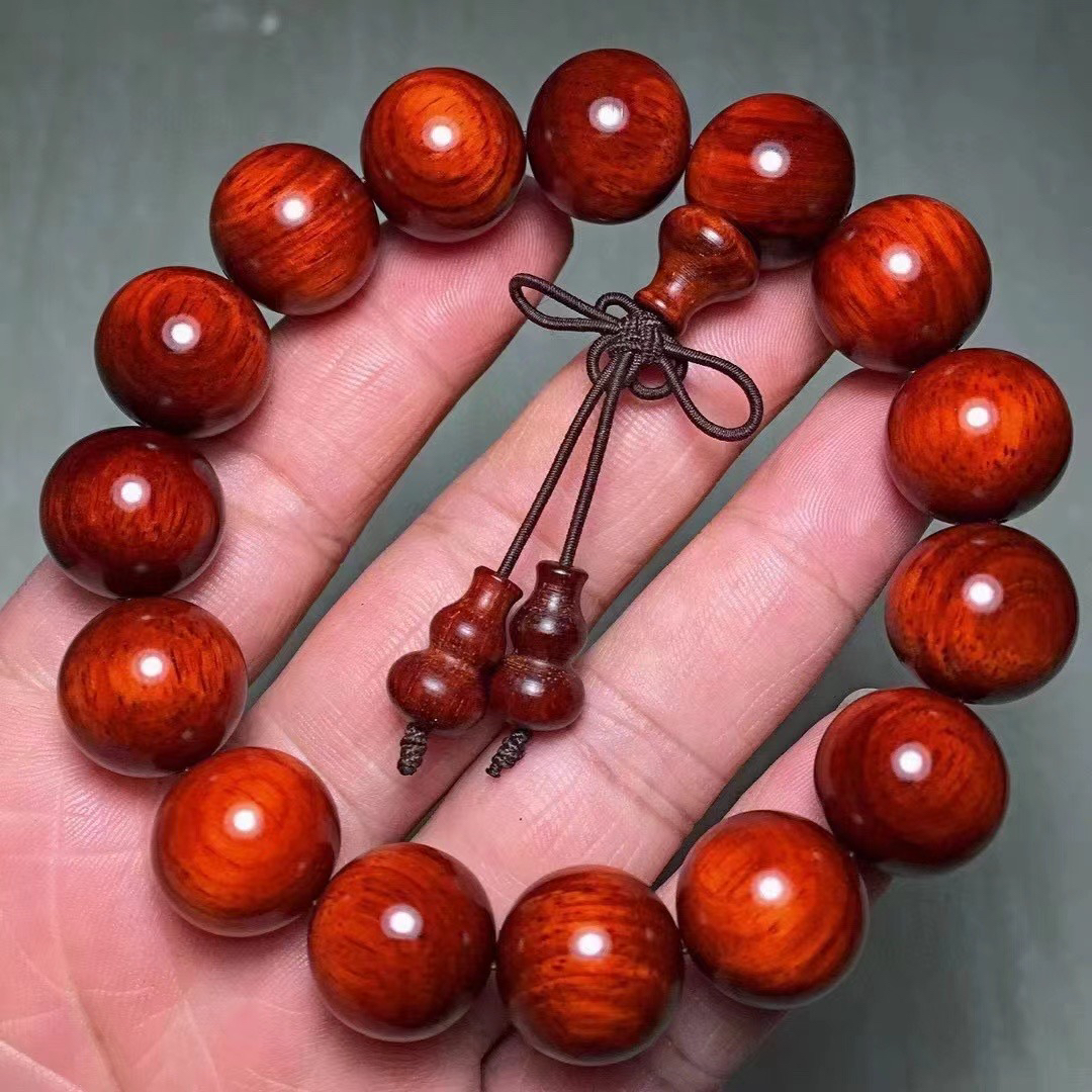 非洲小叶紫檀也称血檀1.5/15颗，鸡血红高油密玻璃底，送礼佳品